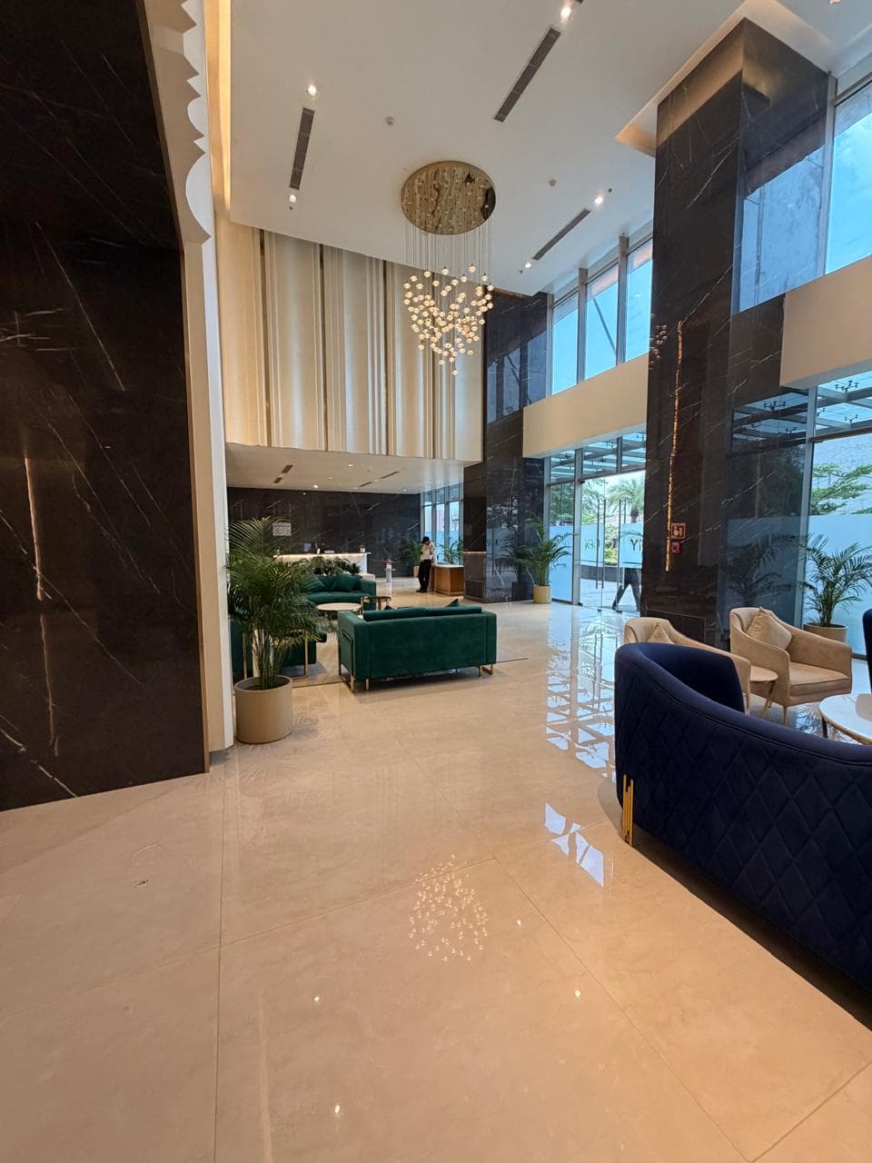 A marble lobby, and a health club below it